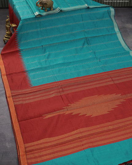 Dupion silk saree teal blue and maroon with allover zari weaves and temple design zari woven border