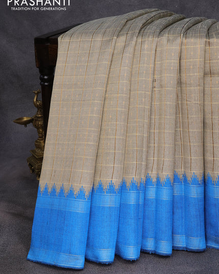 Dupion silk saree beige and cs blue with zari checked pattern & buttas and temple design rettapet zari woven border