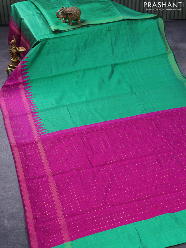 Dupion silk saree green and purple with plain body and temple design zari woven border