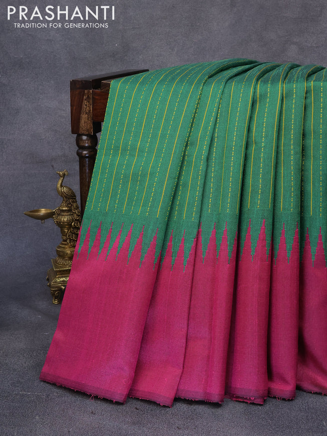 Dupion silk saree green and magenta pink with allover thread stripe weaves and long temple woven border