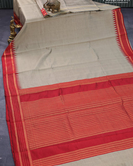 Dupion silk saree beige and maroon with plain body and temple design zari woven border