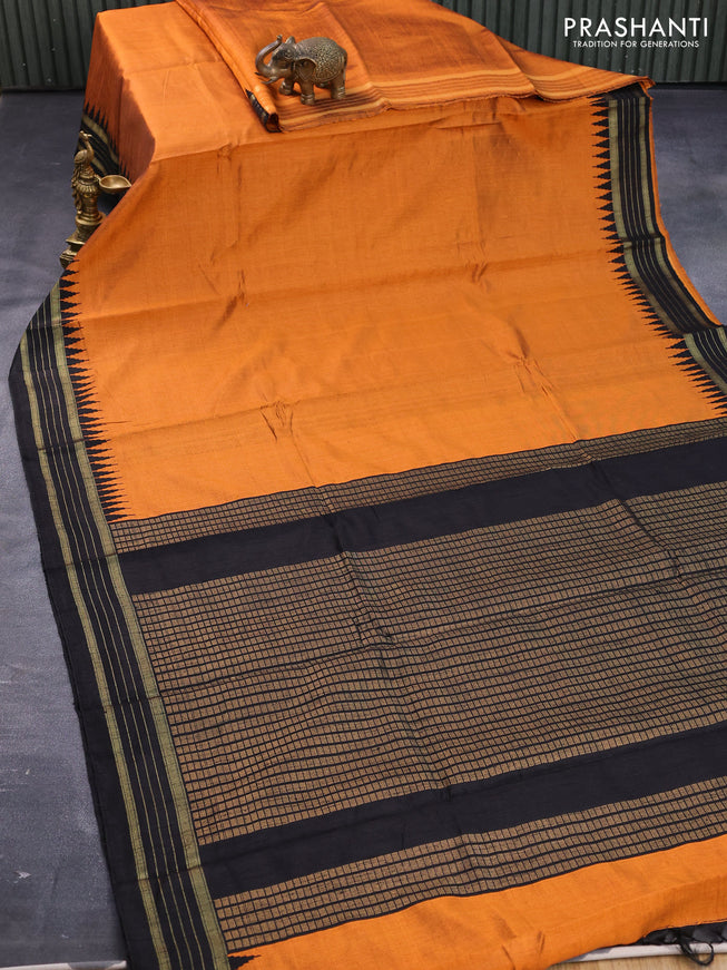 Dupion silk saree orange and black with plain body and temple design zari woven border
