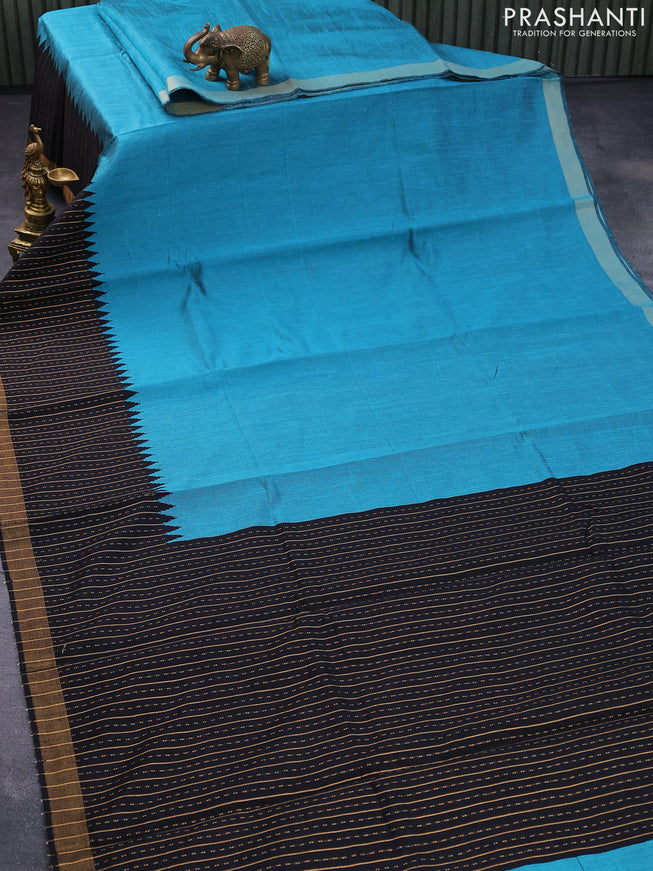 Dupion silk saree teal blue and black with plain body and temple woven zari border