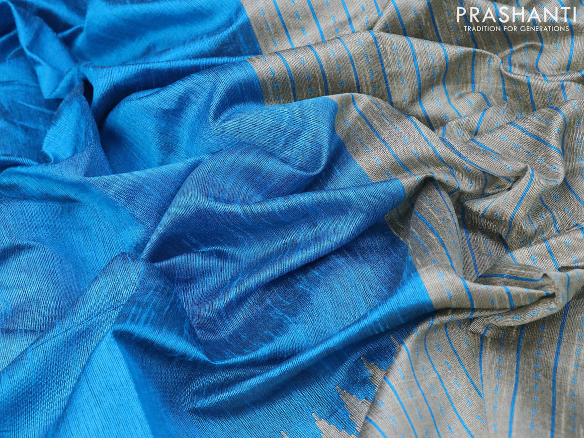 Dupion silk saree cs blue and grey shade with plain body and temple woven zari border