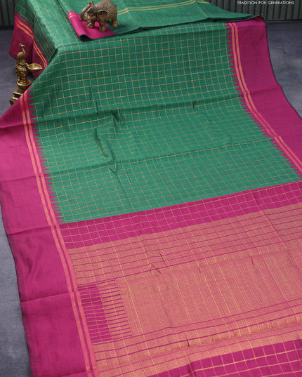 Dupion silk saree green and magenta pink with allover checked pattern and temple design zari woven simple border