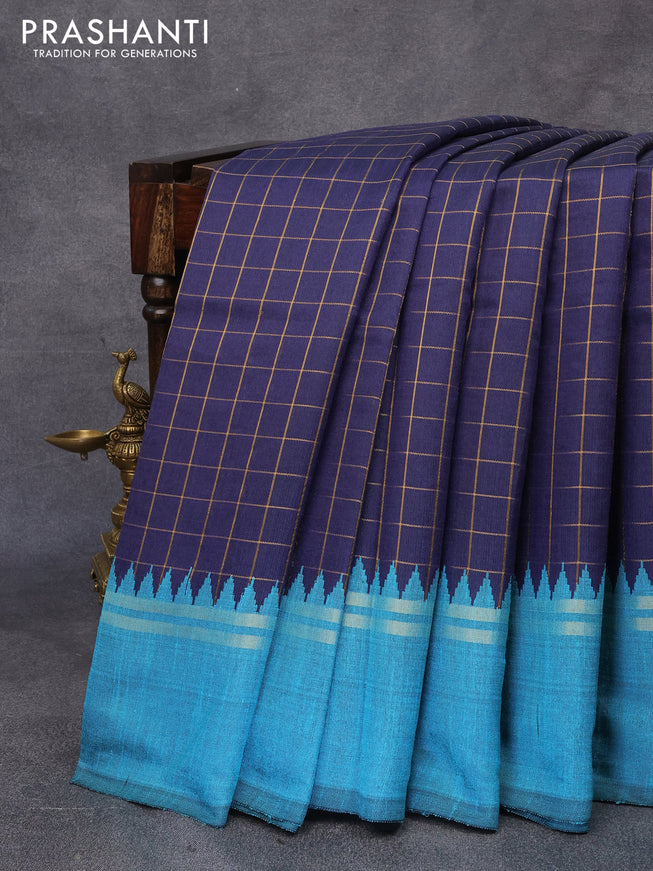 Dupion silk saree dark blue and teal blue with allover checked pattern and temple design zari woven simple border