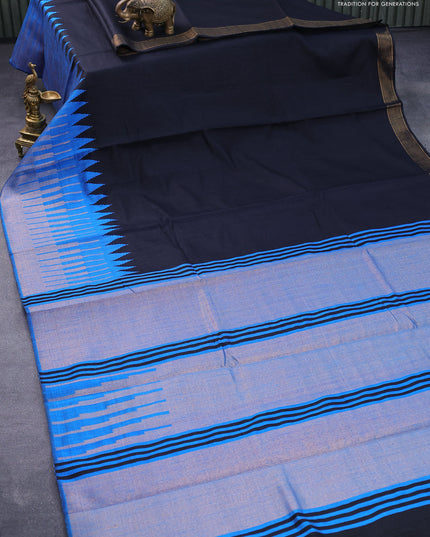 Dupion silk saree black and cs blue with plain body and temple woven zari border