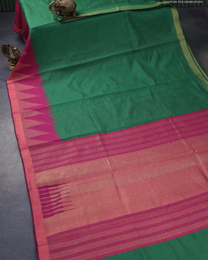 Dupion silk saree green and magenta pink with plain body and temple design zari woven border