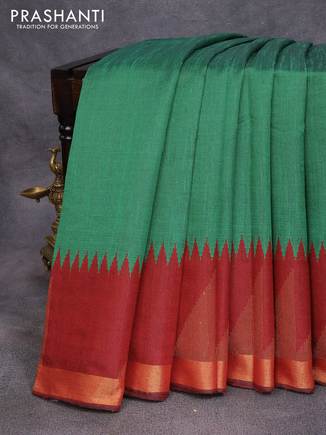 Dupion silk saree green and maroon with plain body and temple design zari woven border