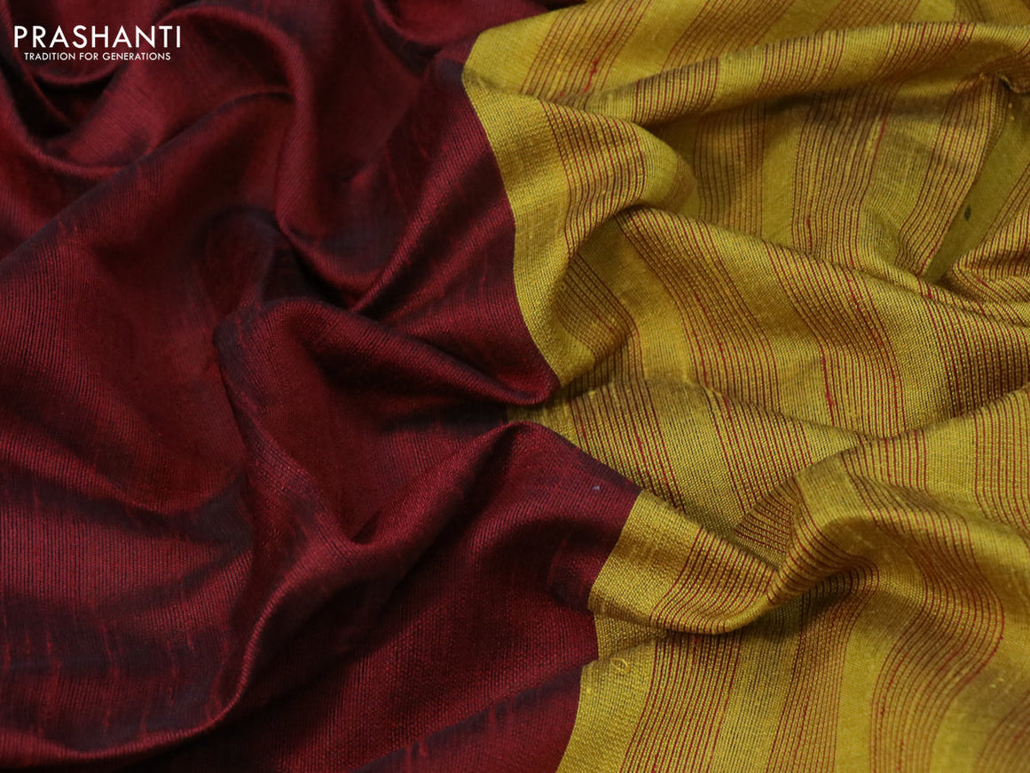 Dupion silk saree maroon and yellow with plain body and temple design zari woven simple border
