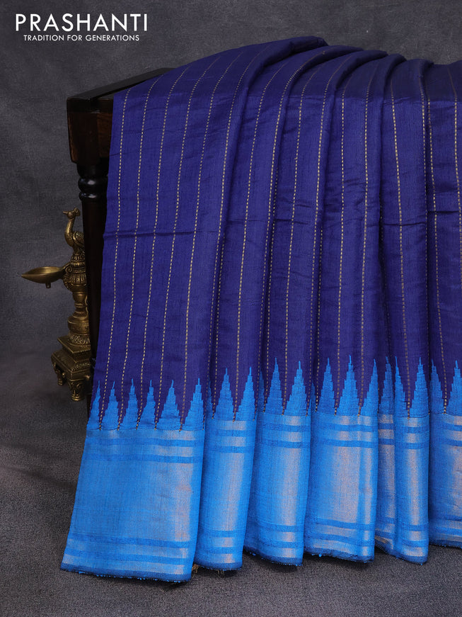 Dupion silk saree blue and cs blue with allover zari weaves and temple woven zari border