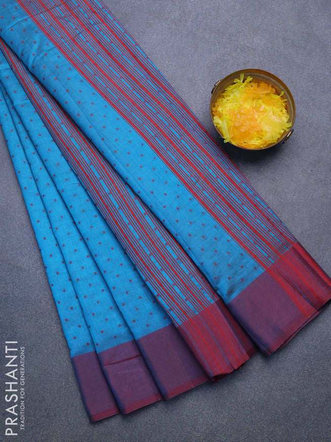 Semi raw silk saree blue and dual shade of maroonish blue with allover thread woven buttas and simple border