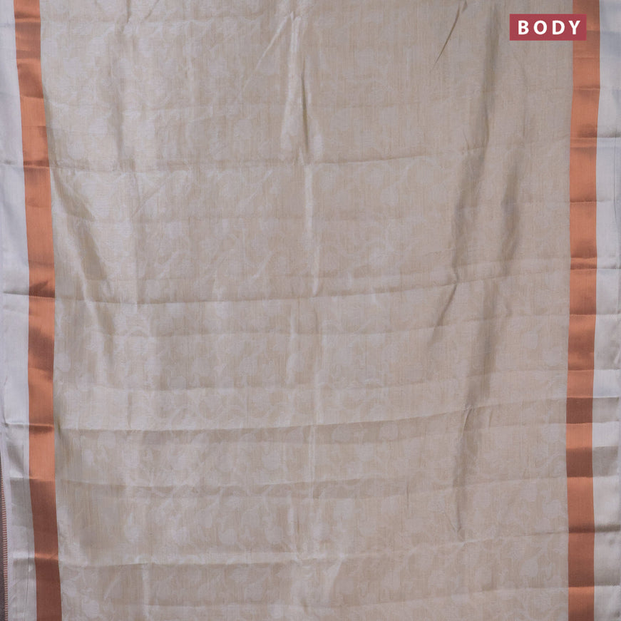 Semi raw silk saree pastel grey with allover self emboss and copper zari woven simple border