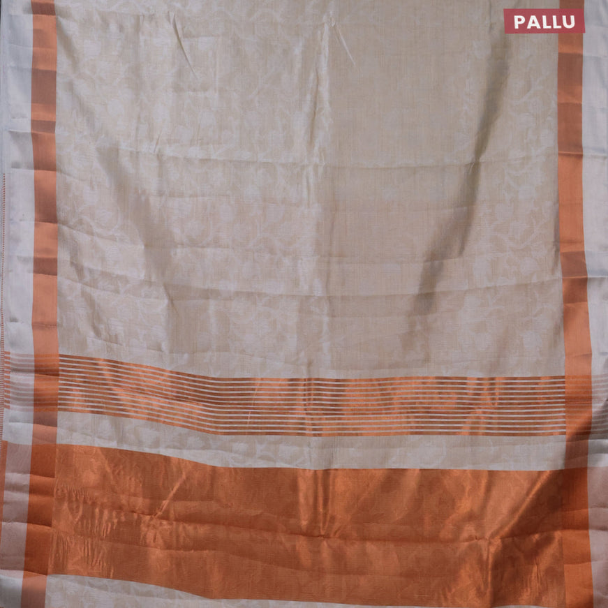 Semi raw silk saree pastel grey with allover self emboss and copper zari woven simple border