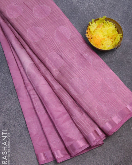 Semi raw silk saree mauve pink with allover pink zari woven buttas and small pink zari woven border