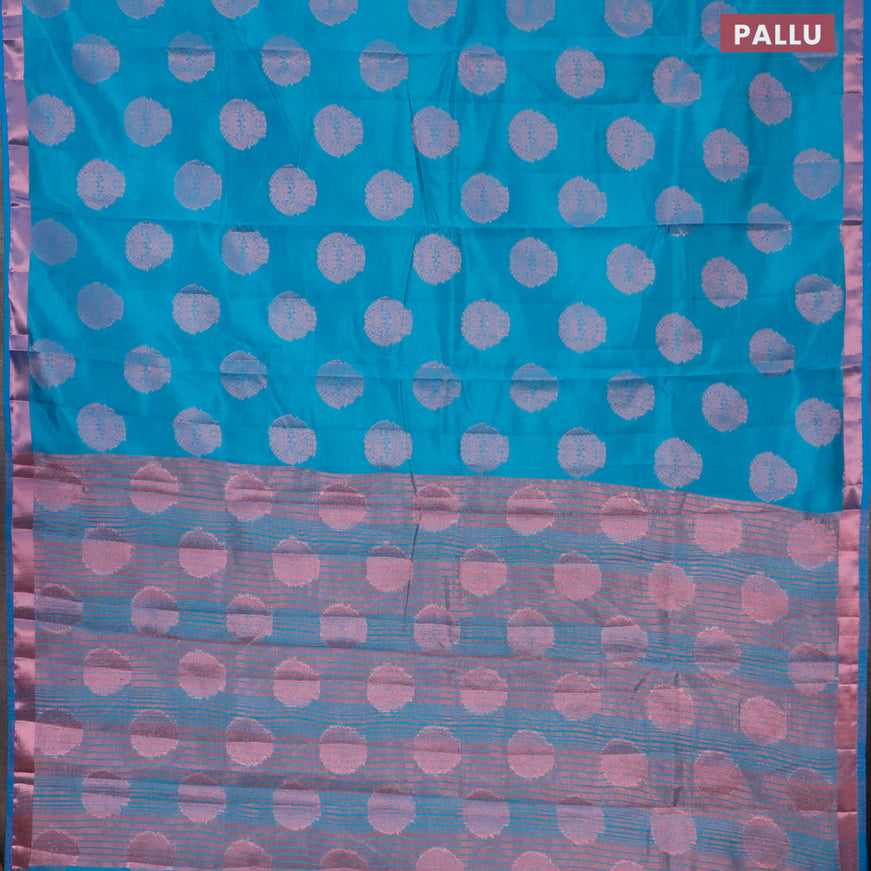 Semi raw silk saree cs blue with allover pink zari woven buttas and small pink zari woven border