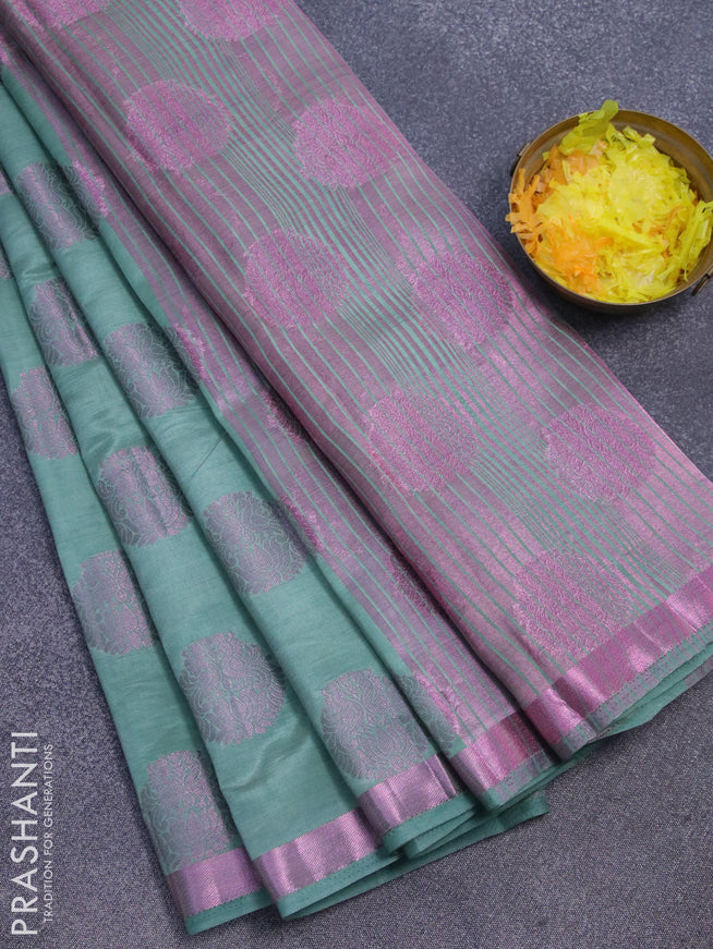 Semi raw silk saree pastel shade with allover pink zari woven buttas and small pink zari woven border