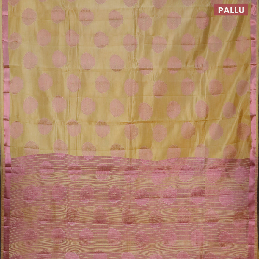 Semi raw silk saree sandal with allover pink zari woven buttas and small pink zari woven border