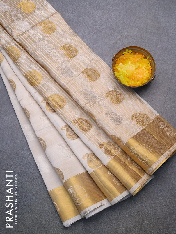 Semi raw silk saree cream with thread & zari woven paisley buttas and zari woven border