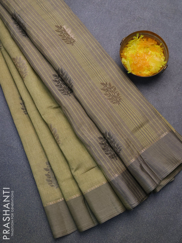 Semi raw silk saree elaichi green with thread & zari woven leaf buttas and zari woven simple border