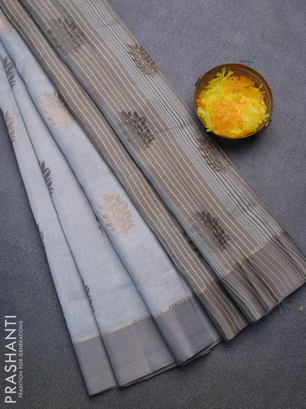 Semi raw silk saree pastel grey with thread & zari woven leaf buttas and zari woven simple border