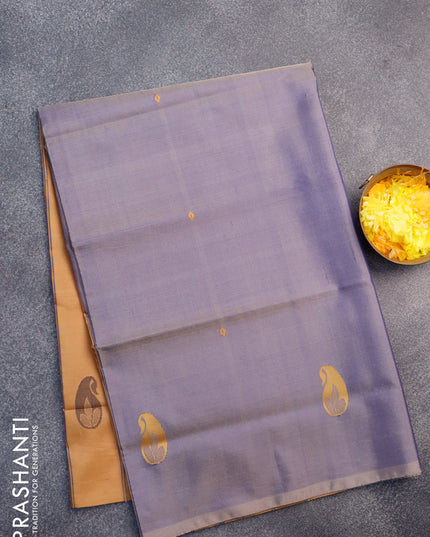 Banana pith saree dual shade of blue and mustard shade with thread woven buttas in borderless style with blouse
