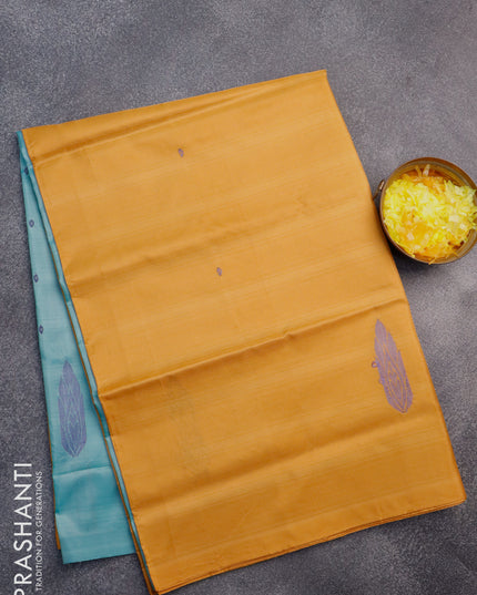Banana pith saree dark mustard and teal blue with thread woven buttas in borderless style with blouse