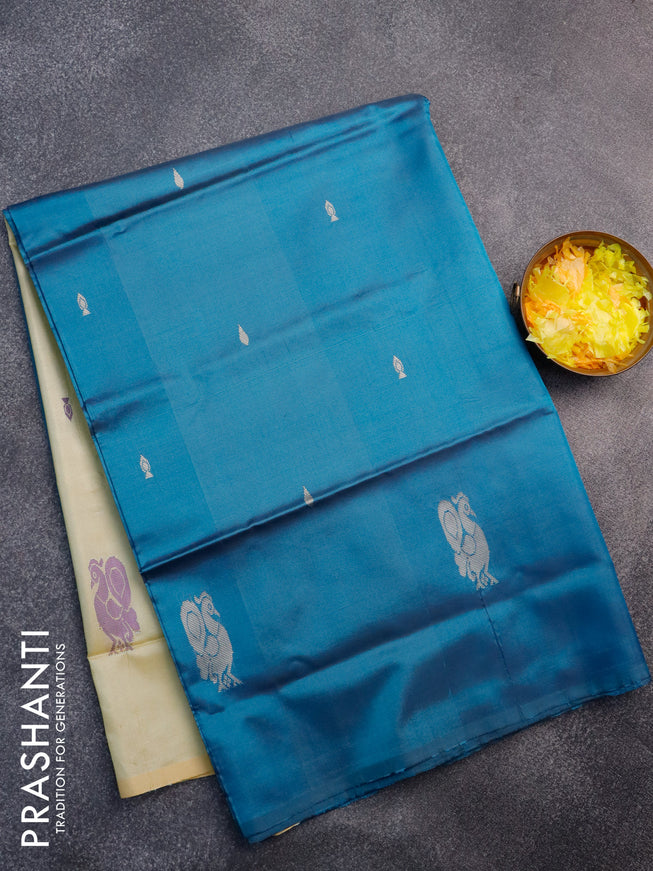 Banana pith saree peacock blue and pale yellow with thread woven buttas in borderless style with blouse