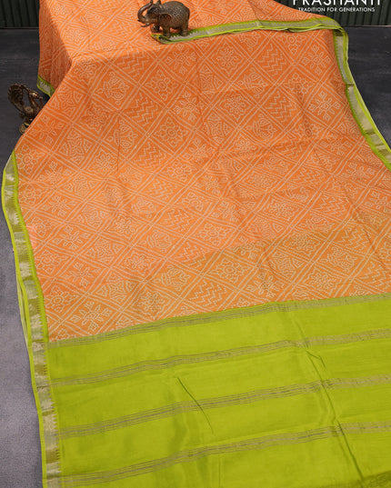 Mangalgiri silk cotton saree orange and lime green with allover bandhani prints and silver zari woven border