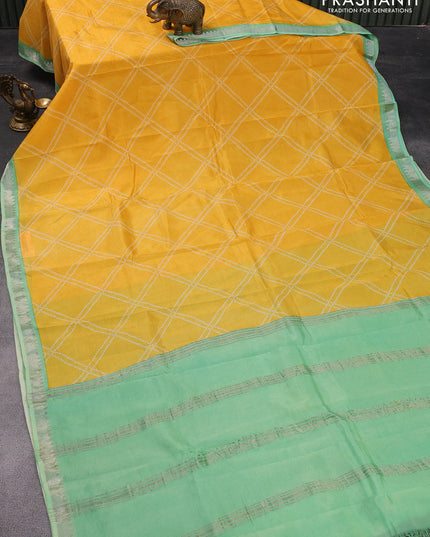 Mangalgiri silk cotton saree mango yellow and teal green with allover bandhani prints and silver zari woven border