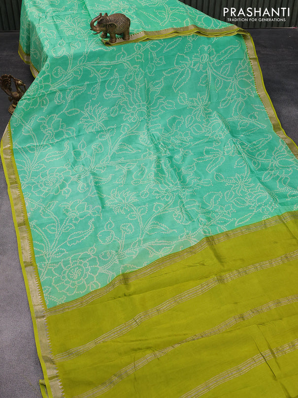 Mangalgiri silk cotton saree teal green and light green with allover bandhani prints and silver zari woven border