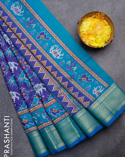 Semi tussar saree blue and teal greenish blue with allover ikat weaves and zari woven border