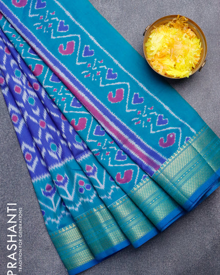 Semi tussar saree blue and teal blue with allover ikat weaves and zari woven border
