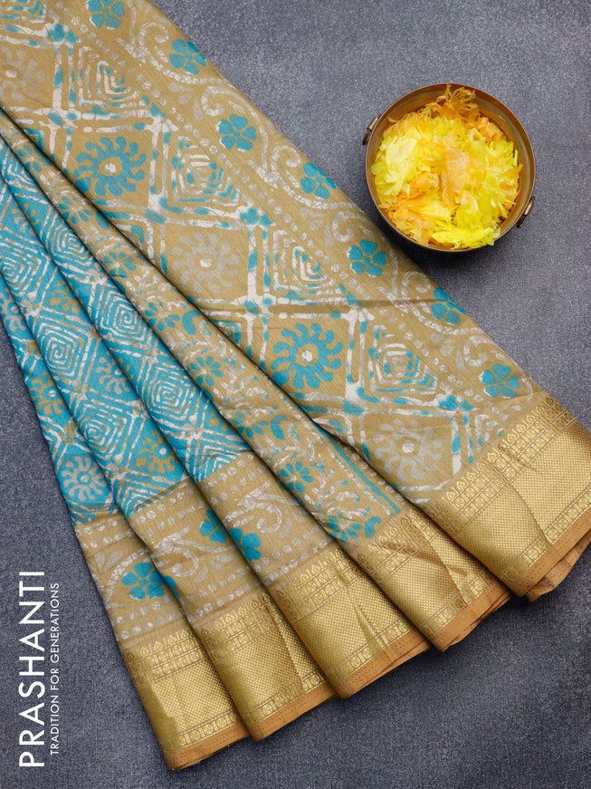 Semi tussar saree teal blue shade and dark sandal with allover batik weaves and zari woven border