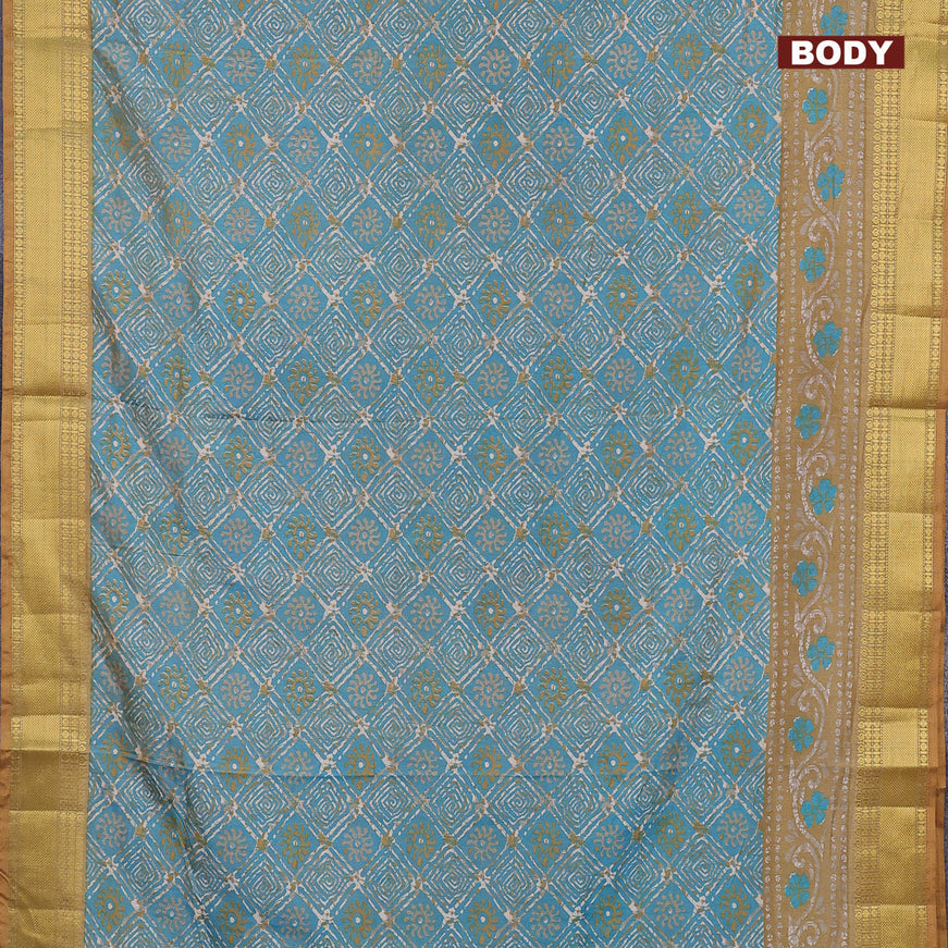 Semi tussar saree teal blue shade and dark sandal with allover batik weaves and zari woven border