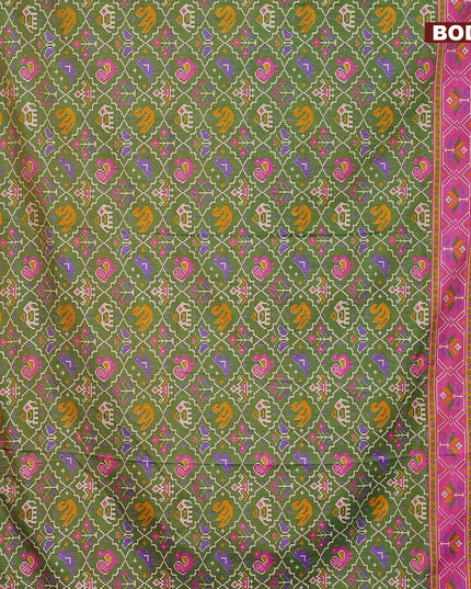 Semi tussar saree green and pink with allover patola weaves and zari woven border