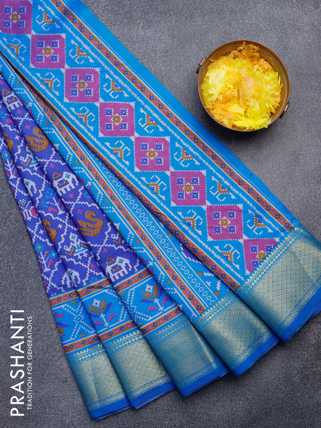 Semi tussar saree blue and cs blue with allover patola weaves and zari woven border