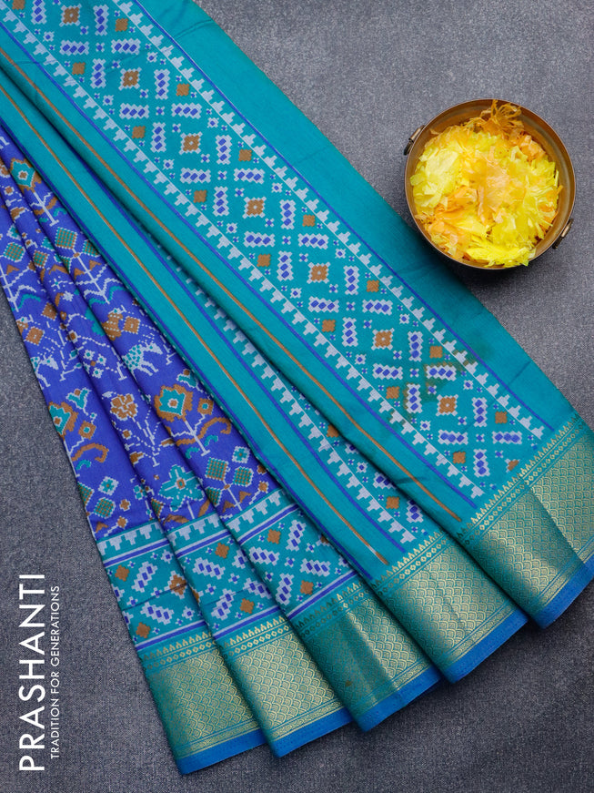 Semi tussar saree blue and dual shade of bluish green with allover ikat weaves and zari woven border