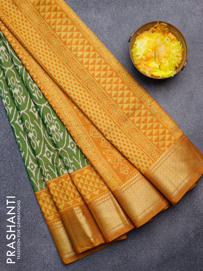 Semi tussar saree green shade and mustard yellow with allover ikat weaves and zari woven border