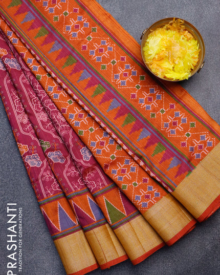 Semi tussar saree dark magenta and rust shade with allover floral prints and zari woven border
