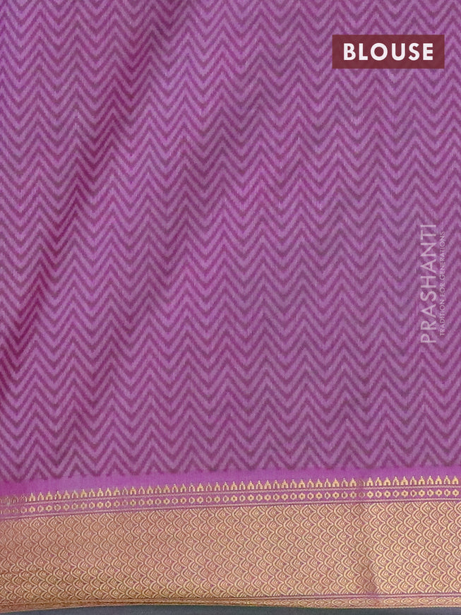 Semi tussar saree green and purple with allover ikat weaves and zari woven border