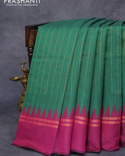 Dupion silk saree green and magenta pink with allover zari weaves and temple design zari woven simple border