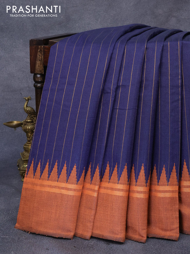 Dupion silk saree dark blue and orange with allover zari weaves and temple design zari woven simple border