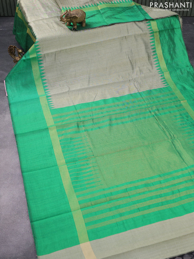 Dupion silk saree mild pista green and green with plain body and temple design zari woven simple border