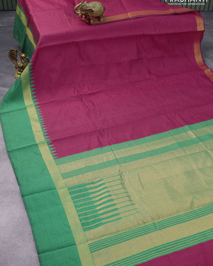 Dupion silk saree magenta pink and green with plain body and temple design zari woven simple border