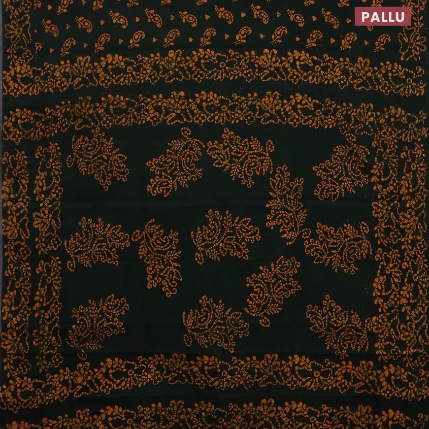 Sungudi cotton saree green with allover batik prints and printed border without blouse