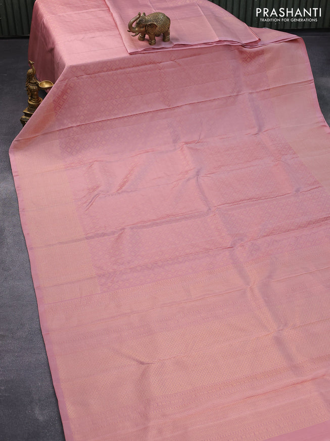 Pure soft silk saree pastel pink with allover zari weaves and zari woven border
