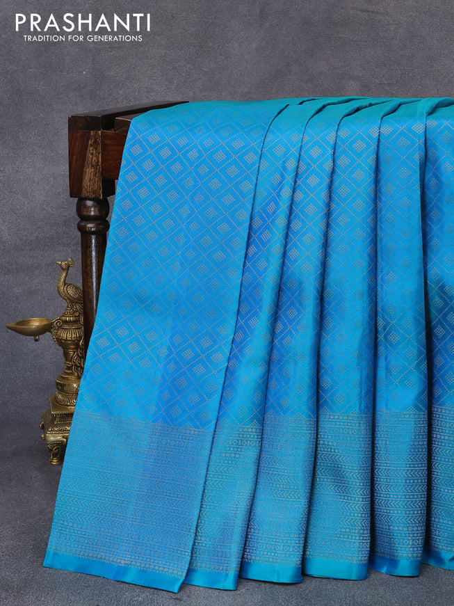 Pure soft silk saree dual shade of bluish green with allover zari weaves and zari woven border