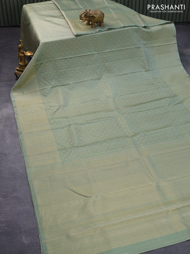 Pure soft silk saree pastel green with allover zari weaves and zari woven border