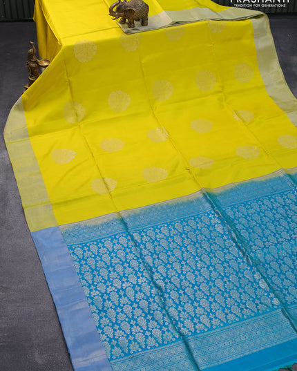 Pure soft silk saree lime yellow and dual shade of teal blue with silver zari woven buttas and silver zari woven border